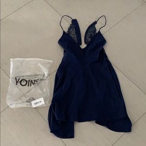 Blue open back dress, never worn.